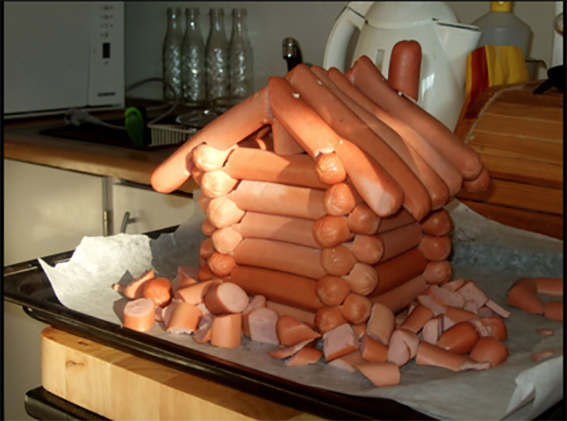 hot dogs arranged as an log cabin using notching technique